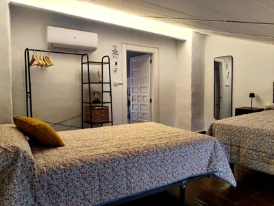 Cama o camas de una habitación en Alojamiento Rural Ciudad Monumental