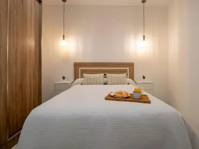 Cama o camas de una habitación en BHost - Juan de Mena