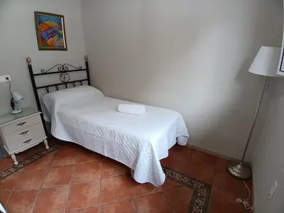 Cama o camas de una habitación en Budget and lovely rooms Macarena B