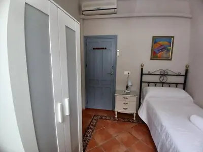 Cama o camas de una habitación en Budget and lovely rooms Macarena B