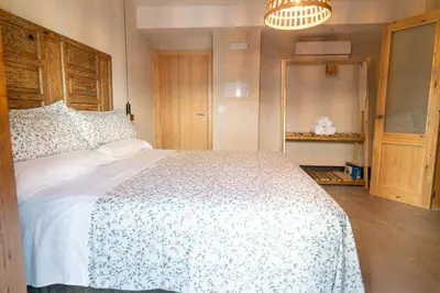 Cama o camas de una habitación en Bonita Burell Boutique