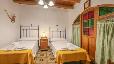 Cama o camas de una habitación en Casa El Coronel by Ruralidays