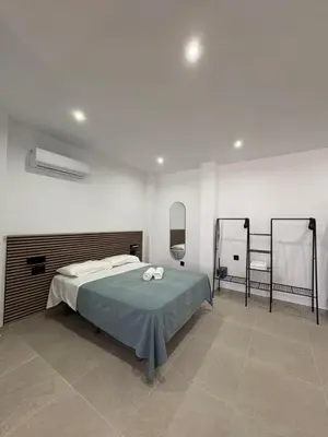 Cama o camas de una habitación en Las Casas Del Puente