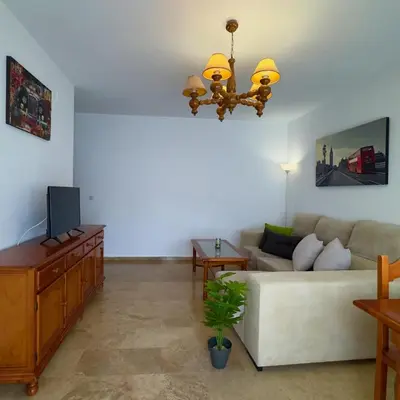 Una televisión o centro de entretenimiento en Bellavista - Apartamento céntrico y tranquilo con Parking