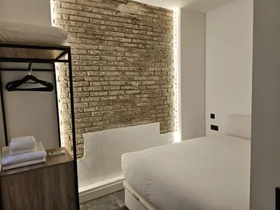 Cama o camas de una habitación en Suite Aromas del Califato