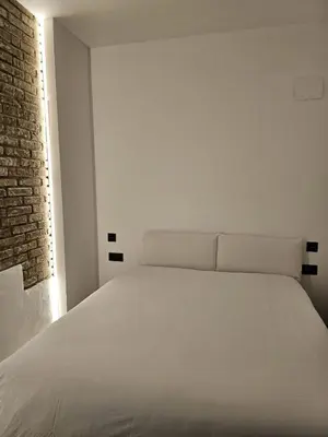 Cama o camas de una habitación en Suite Aromas del Califato