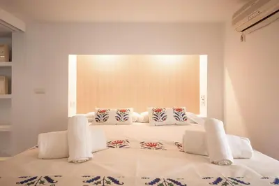 Cama o camas de una habitación en Puerta Osario Oasis by Valcambre