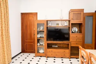 Una televisión o centro de entretenimiento en Piso turístico Aranda Paniagua