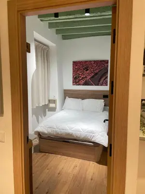 Cama o camas de una habitación en Hospedería El Reloj 2 bedrooms