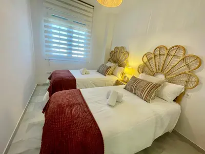 Cama o camas de una habitación en Geysotur La Estación
