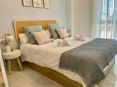 Cama o camas de una habitación en Geysotur La Estación