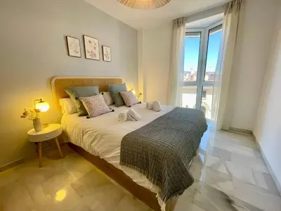 Cama o camas de una habitación en Geysotur La Estación