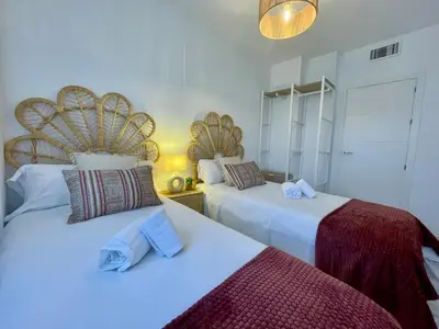 Cama o camas de una habitación en Geysotur La Estación
