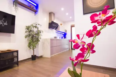 Una televisión o centro de entretenimiento en San Marcos Suite II