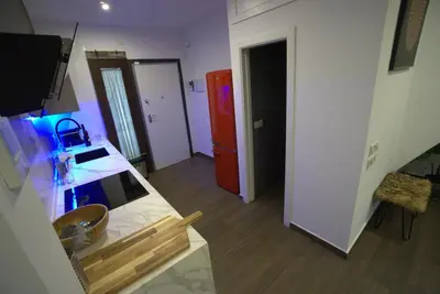 Una cocina o zona de cocina en San Marcos Suite II
