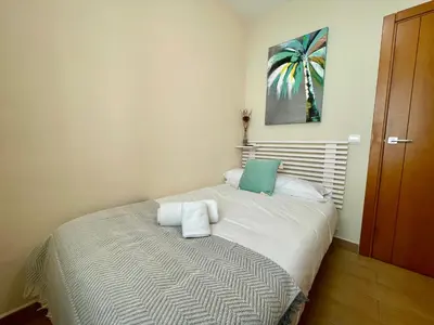 Cama o camas de una habitación en Geysotur Patio Marroquies