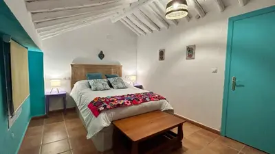 Cama o camas de una habitación en La Casa de los Colores