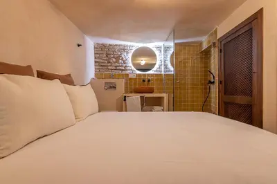 Cama o camas de una habitación en Zarí Apartamentos