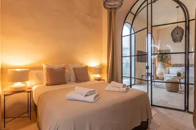 Cama o camas de una habitación en Zarí Apartamentos