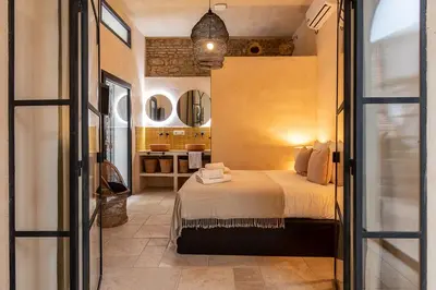 Cama o camas de una habitación en Zarí Apartamentos