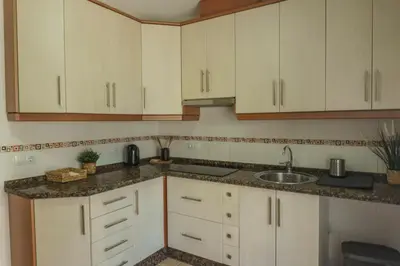 Una cocina o zona de cocina en APARTAMENTOS CRUCE de CAMINOS