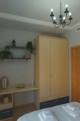 Cama o camas de una habitación en APARTAMENTOS CRUCE de CAMINOS