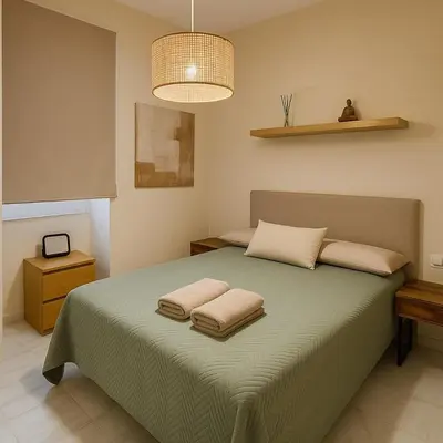 Cama o camas de una habitación en Wish Suite San Roman