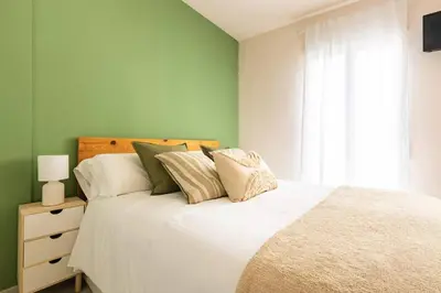 Cama o camas de una habitación en Casa 3 plantas con patio y Solárium privados