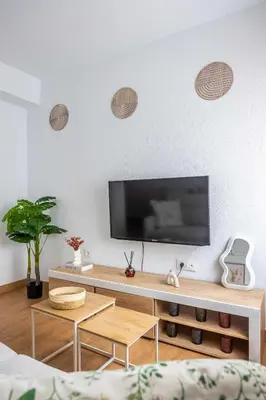 Una televisión o centro de entretenimiento en Oasis de Santa Justa