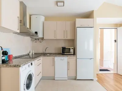 Una cocina o zona de cocina en San Julian Ático terraza