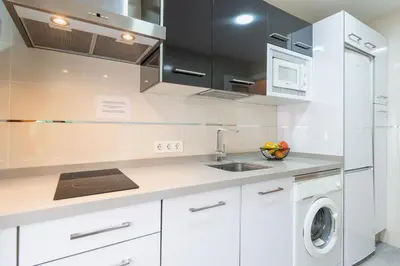 Una cocina o zona de cocina en Panther Home San Roque