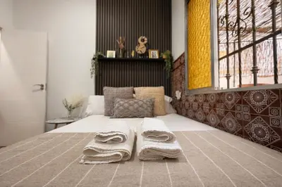 Cama o camas de una habitación en Rooms Cruz Roja