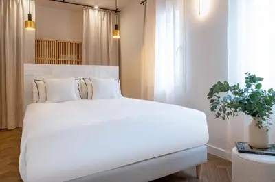 Cama o camas de una habitación en Magno Apartments Robles