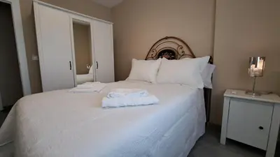 Cama o camas de una habitación en Apartamentos María Cristina 2, Parking Gratis Vistas Históricas
