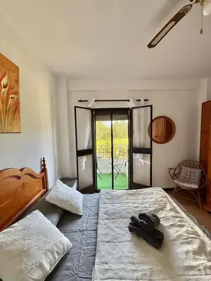 Cama o camas de una habitación en El pisito de los Lagos
