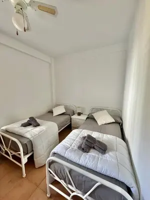 Cama o camas de una habitación en El pisito de los Lagos