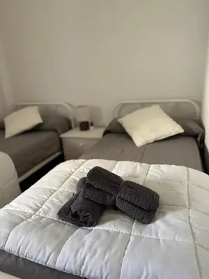 Cama o camas de una habitación en El pisito de los Lagos