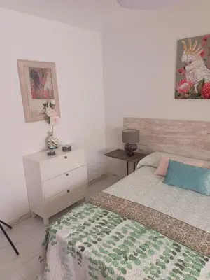 Cama o camas de una habitación en Apartamento AVENIDA