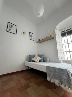 Cama o camas de una habitación en El Rincón del Tuno