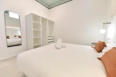 Cama o camas de una habitación en Riverside Suits
