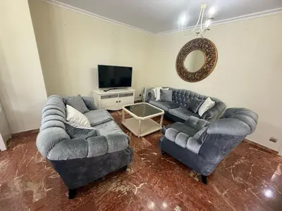Una televisión o centro de entretenimiento en Apartamento Damasco