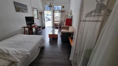 Una televisión o centro de entretenimiento en Loft en casco historico Macarena