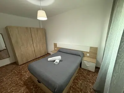 Cama o camas de una habitación en AVENIDA CENTRO 2 Dormitorios PONDOS