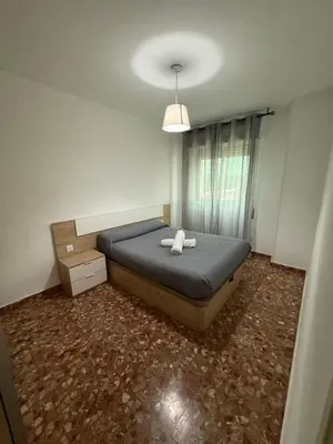 Cama o camas de una habitación en AVENIDA CENTRO 2 Dormitorios PONDOS