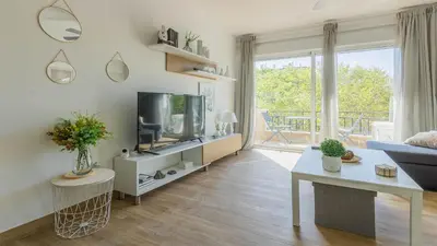 Una televisión o centro de entretenimiento en Apartamento Sol de Libia Cordoba