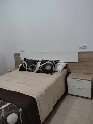Cama o camas de una habitación en Apartamento FERIA