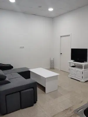 Una televisión o centro de entretenimiento en Apartamento FERIA