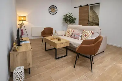 Zona de estar de Apartamento Esencia en la Roca
