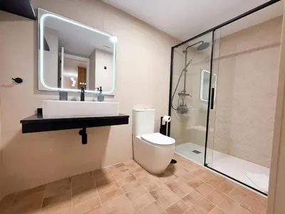 Un baño de MonKeys Apartments Quintana Q1