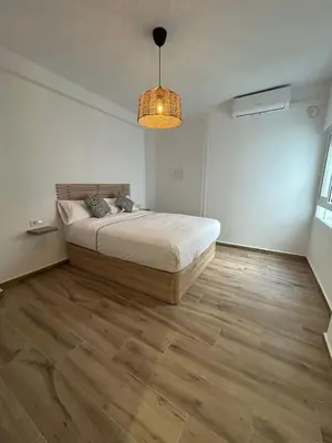 Cama o camas de una habitación en Apartamento Escañuela